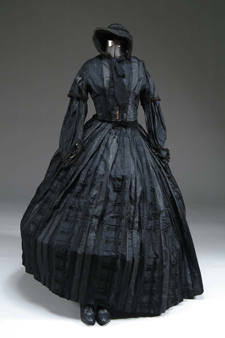 Appraisal: CIVIL WAR ERA LADIES MOURNING DRESS BONNET Black silk skirt