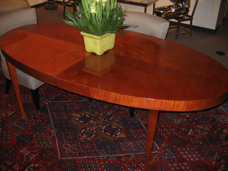 Appraisal: BAKER FURNITURE Mahogany oval dining table raised on tapering square