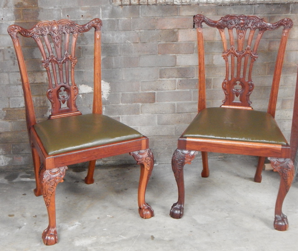 Appraisal: A pair of Chippendale revival mahogany finish boardroom chairs each