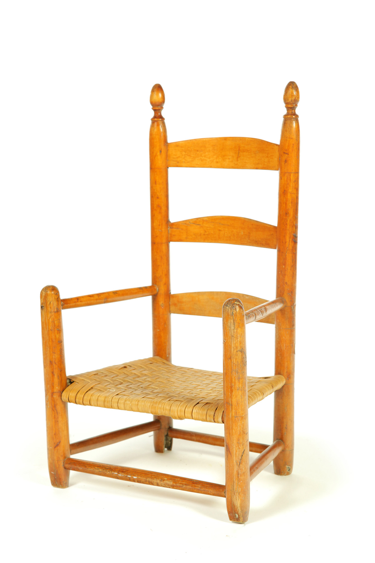 Appraisal: CHILD'S LADDERBACK ARMCHAIR American th century maple Arched slats and