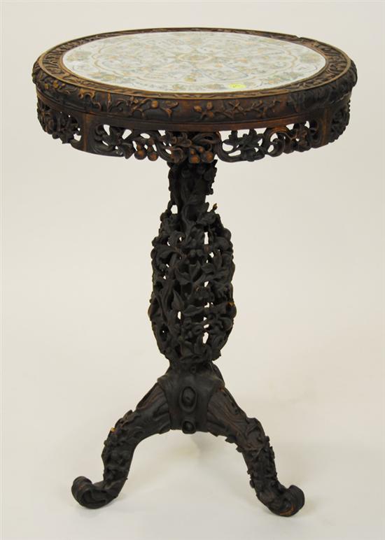 Appraisal: CHINESE CARVED HARDWOOD PORCELAIN INSET TRIPOD TABLE height inches diameter