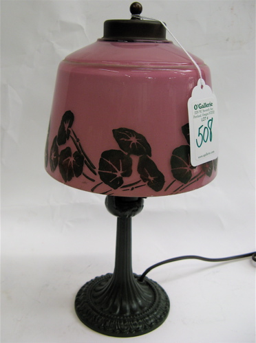 Appraisal: AN ALADDIN TABLE LAMP with glass shade painted pink interior