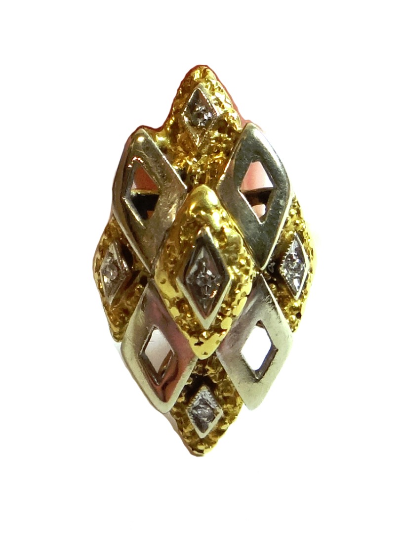 Appraisal: A two colour gold and diamond set ring in a