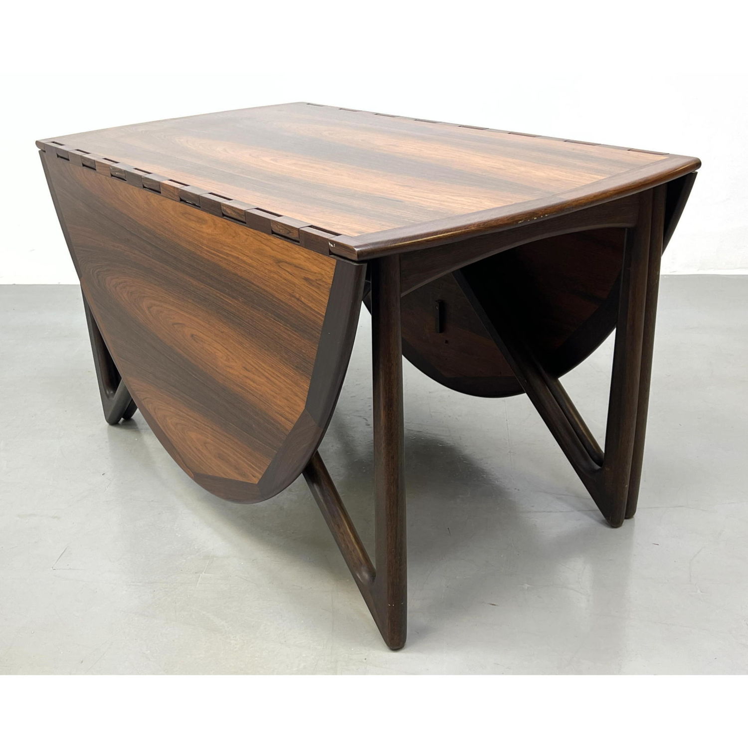 Appraisal: KURT OSTERVIG Danish Modern Rosewood Dining Table Marked on underside