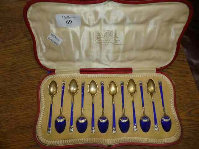 Appraisal: A CASED SET OF TWELVE CONTINENTAL SILVER BLUE ENAMEL DECORATED