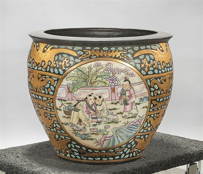 Appraisal: Chinese gilt painted and enameled porcelain jardiniere depicting children in