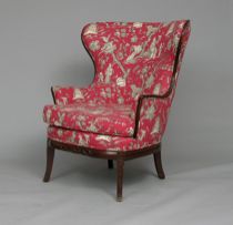 Appraisal: Upolstered Wing Back Chair Arm chair upholstered in red and