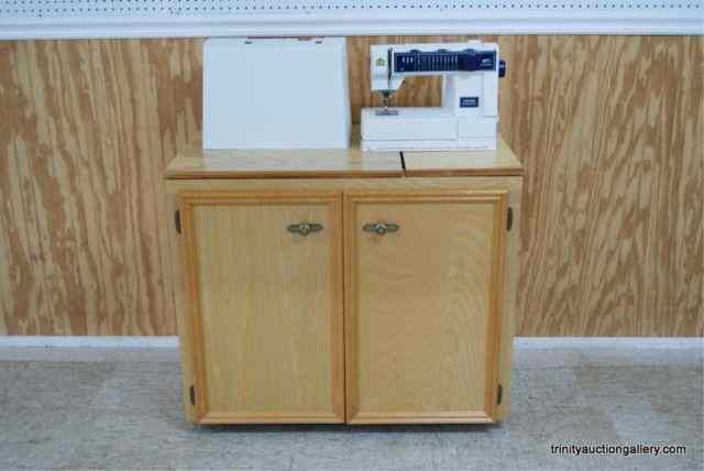 Appraisal: Husqvarna Selectronic Sewing MachineWith handmade custom sewing machine cabinet and