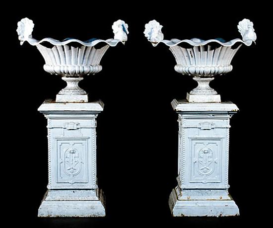 Appraisal: Pair painted cast-iron planters on pedestals lobed flared basin with