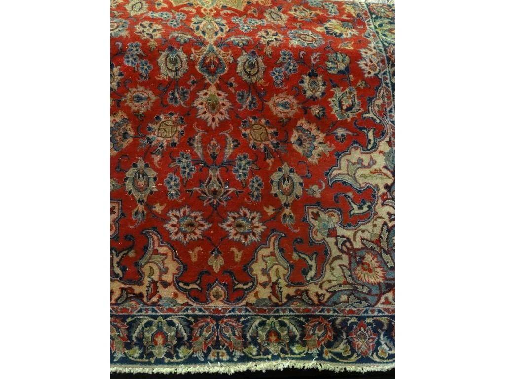 Appraisal: An Indian style carpet with a central floral medallion with