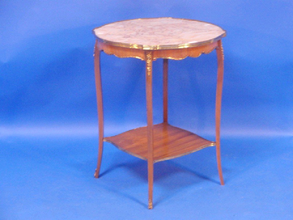 Appraisal: A thC French circular centre table with rouge marble top