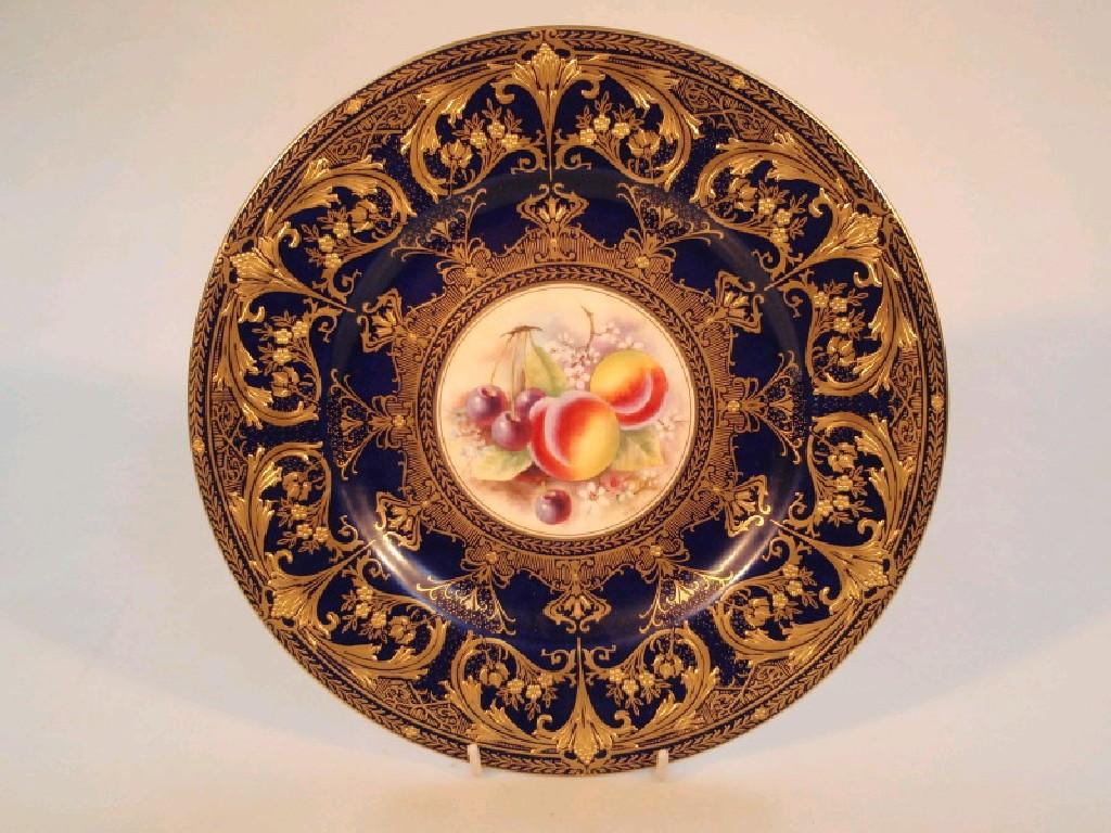 Appraisal: A Royal Worcester cabinet plate with gilt enriched deep blue