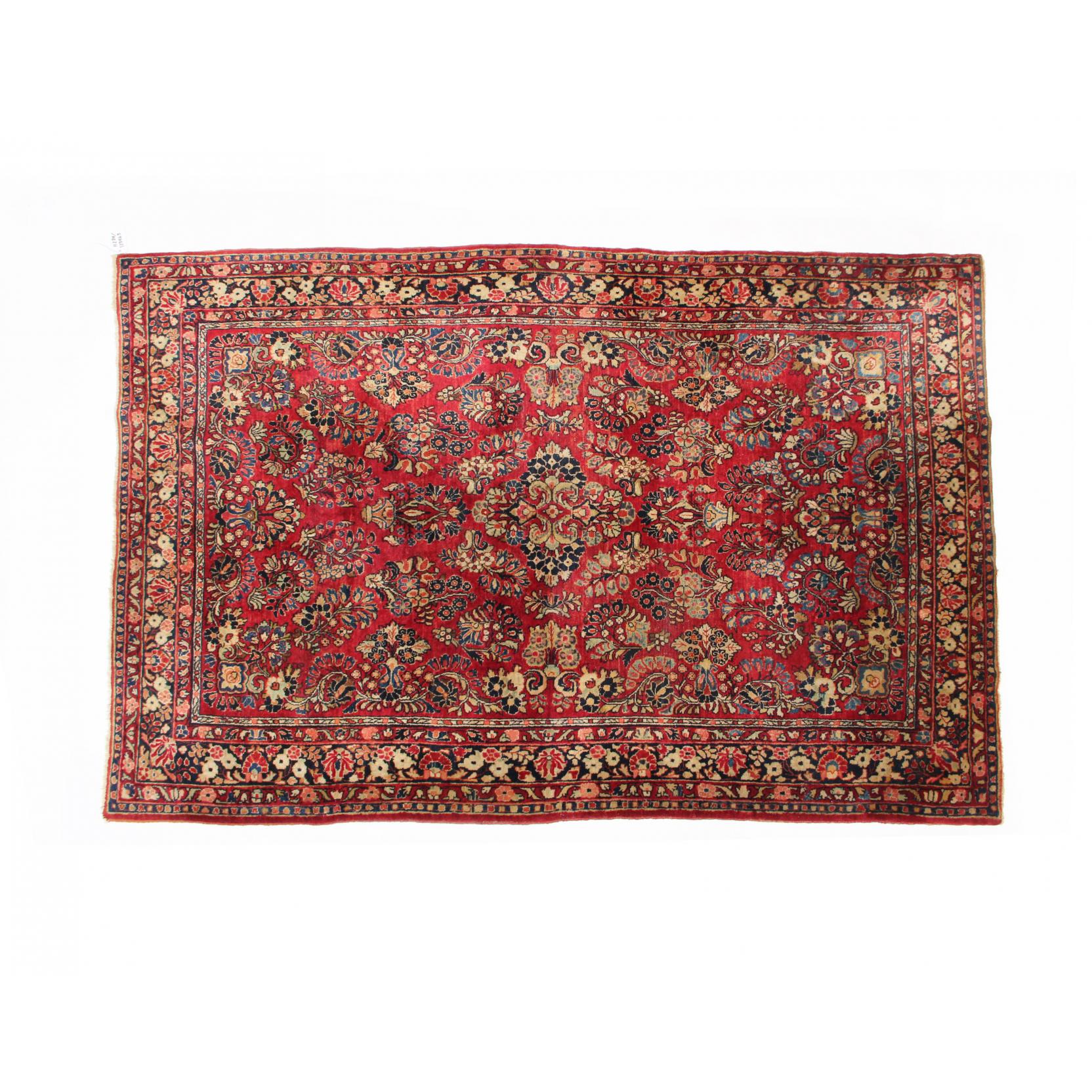 Appraisal: Sarouk Carpet circa red field with floral spray motif ft