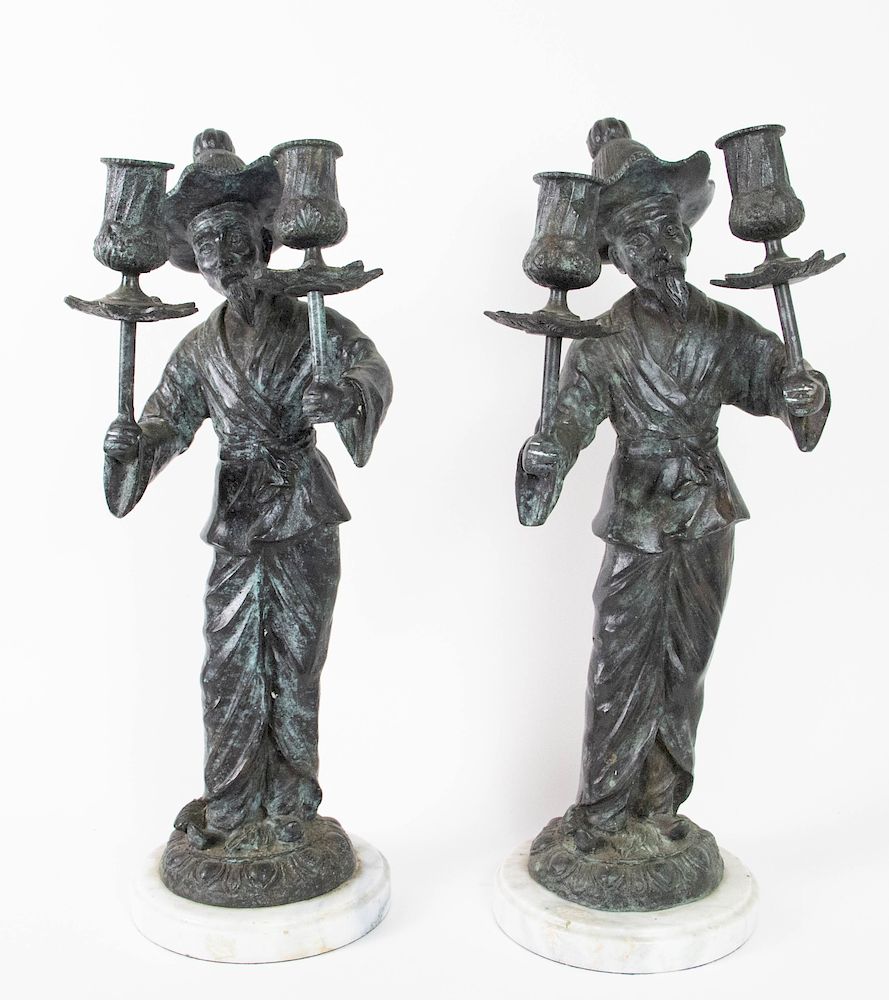 Appraisal: Pair of Bronze Chinoiserie Mandarin-Form Candle Sticks th Century Mounted