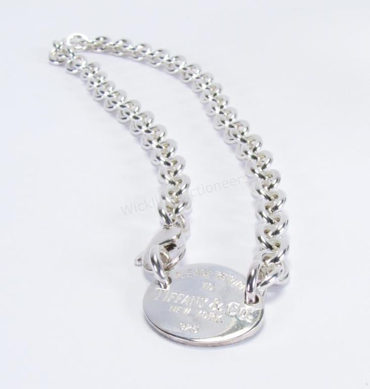 Appraisal: A sterling silver Tiffany Co Oval Tag Necklace with Please