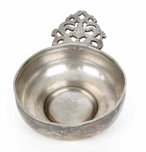 Appraisal: Providence Rhode Island pewter flower handle porringer ca bearing the