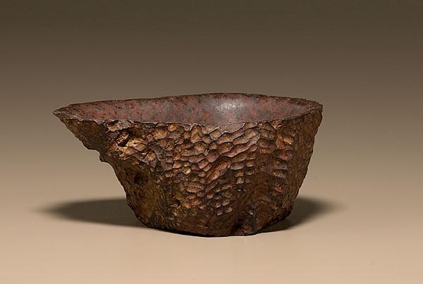 Appraisal: BURL BOWL WITH SPOUT th or th century gouged exterior