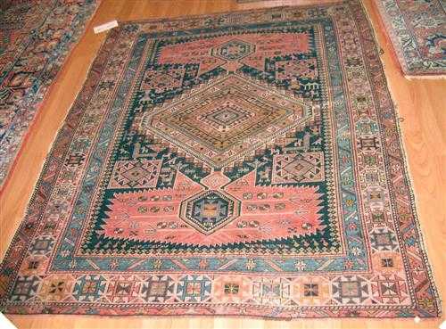 Appraisal: SHIRVAN antique Blue central field with bulky medallions in beige