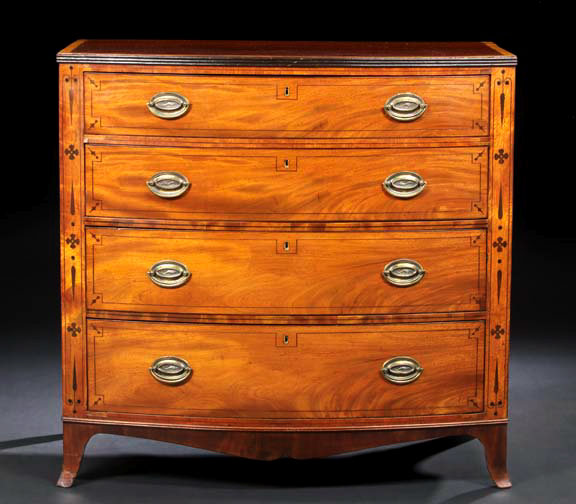 Appraisal: Regency Mahogany Bowfront Chest early th century the banded and