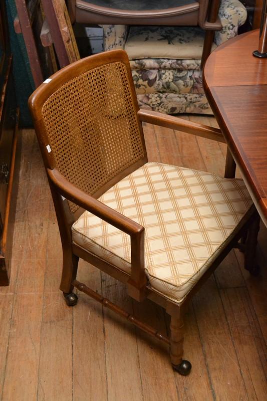 Appraisal: A SET OF FOUR ANTIQUE STYLE RATTAN BACKED CHAIRS ON