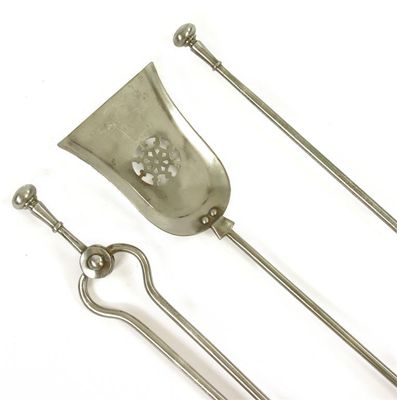 Appraisal: A set of three polished steel fire tools with turned