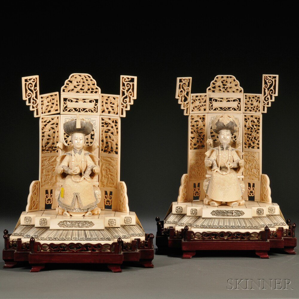 Appraisal: Two Ivory Carvings of an Imperial Couple China each sitting