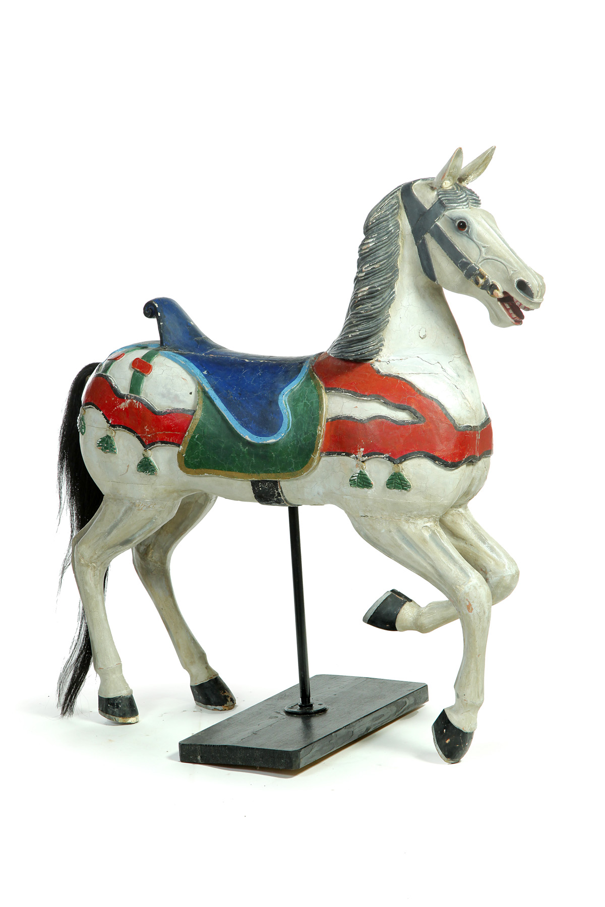 Appraisal: CARVED AND PAINTED CAROUSEL HORSE Early th century pine Glass