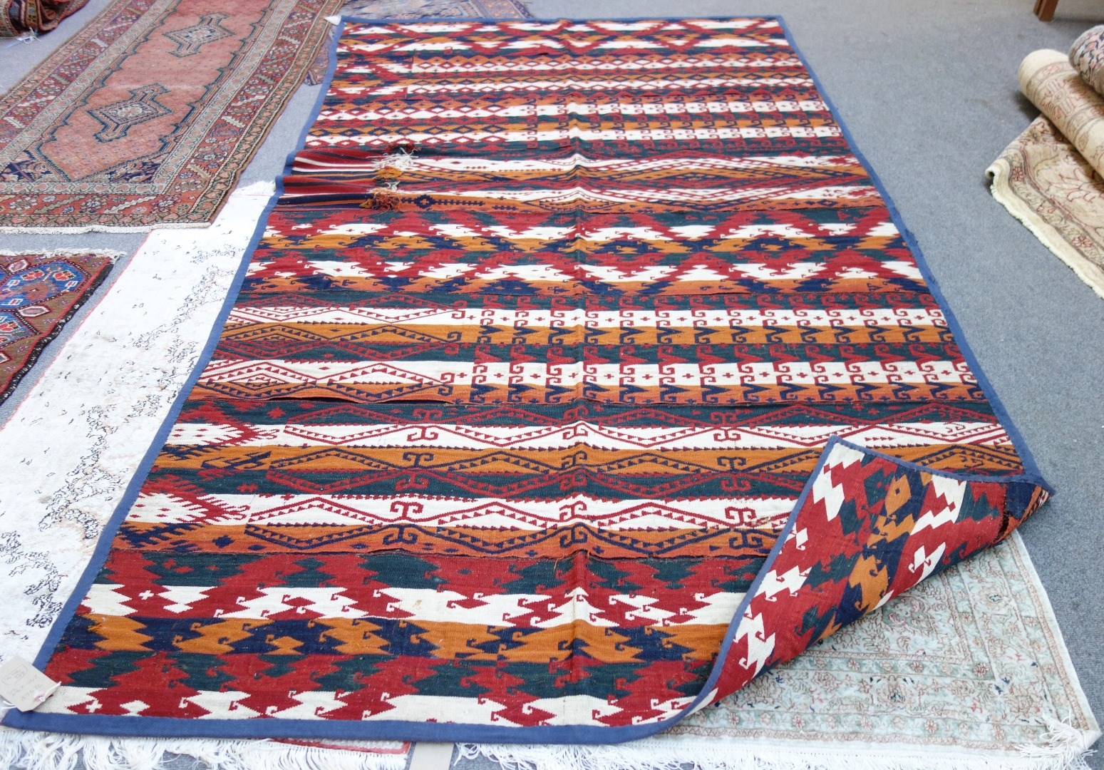 Appraisal: A Turkestan flatweave with banded decoration cm x cm