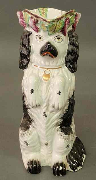 Appraisal: Staffordshire begging black and white spaniel jug th c with