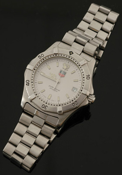 Appraisal: A Gents Tag Heuer wristwatch Quartz circular silver dial lock