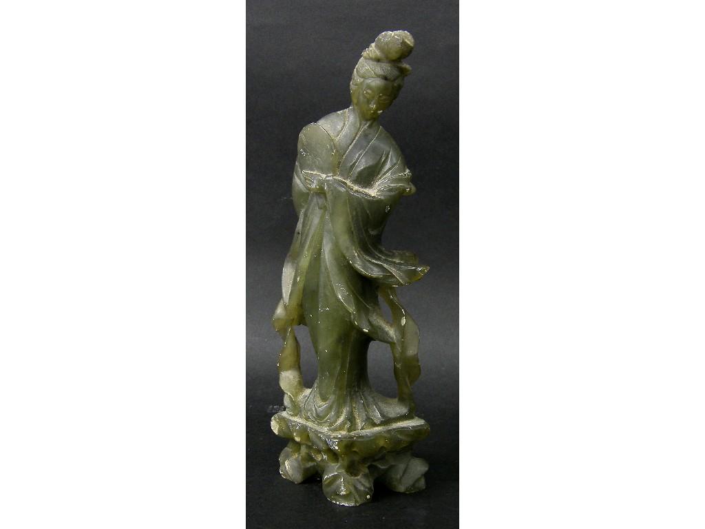 Appraisal: Oriental green stone figure modelled as a young lady holding