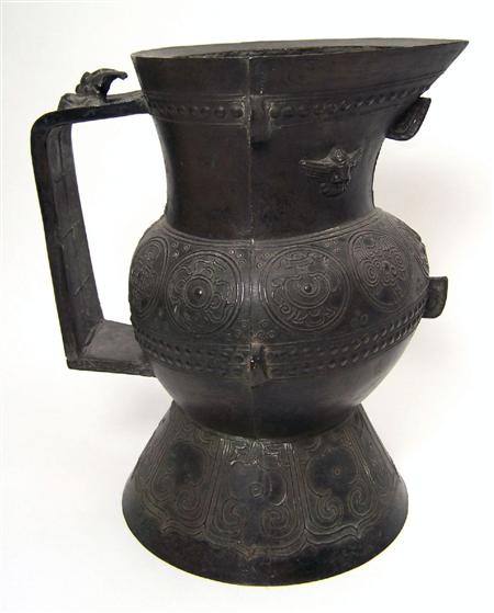 Appraisal: LARGE CHINESE BRONZE JUG with globular body and spreading foot