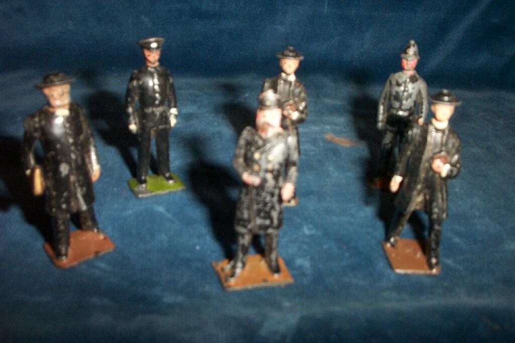 Appraisal: A small collection of cast and painted metal figures including