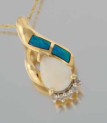 Appraisal: A Ladies' Opal and Diamond Pendant on Chain k yellow