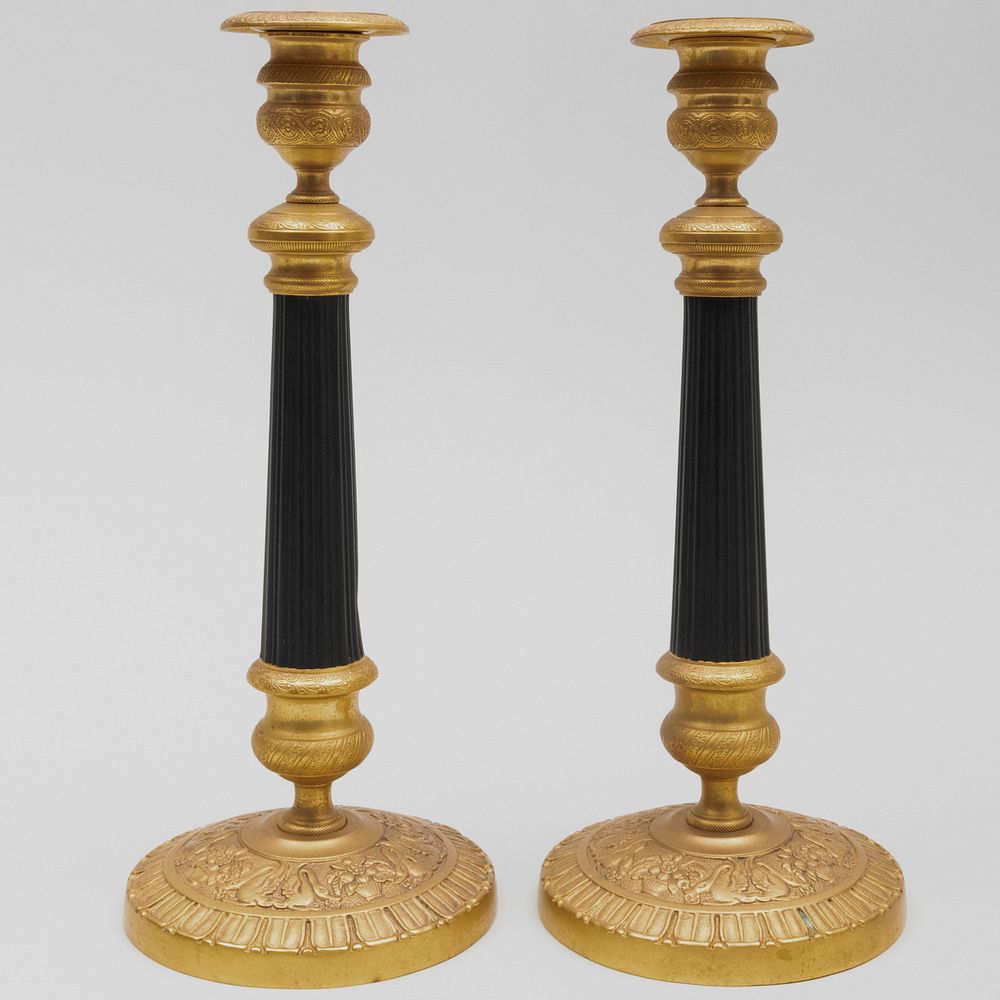 Appraisal: Pair of Charles X Style Gilt-Metal and Patinated Metal Candlesticks