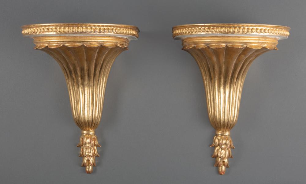 Appraisal: Pair of Painted and Parcel Gilt Wall Brackets beaded shelf