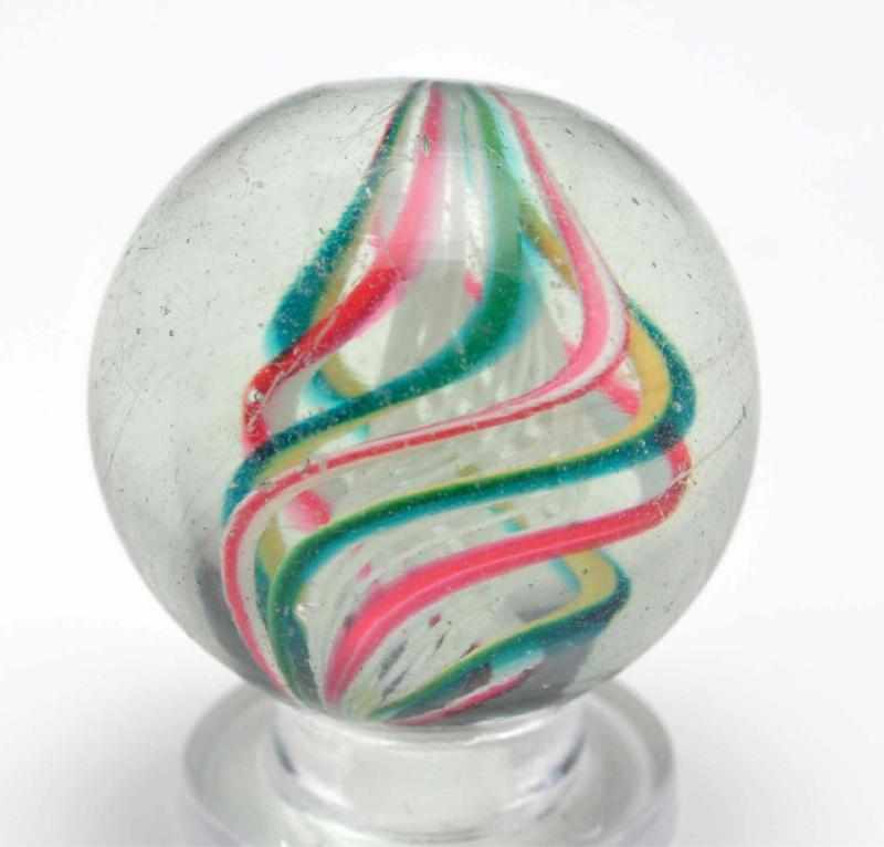 Appraisal: Caged White Latticino Tornado Twist Marble Description Green underlined in