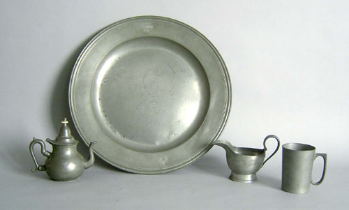 Appraisal: English pewter charger dia together with a teapot mug and