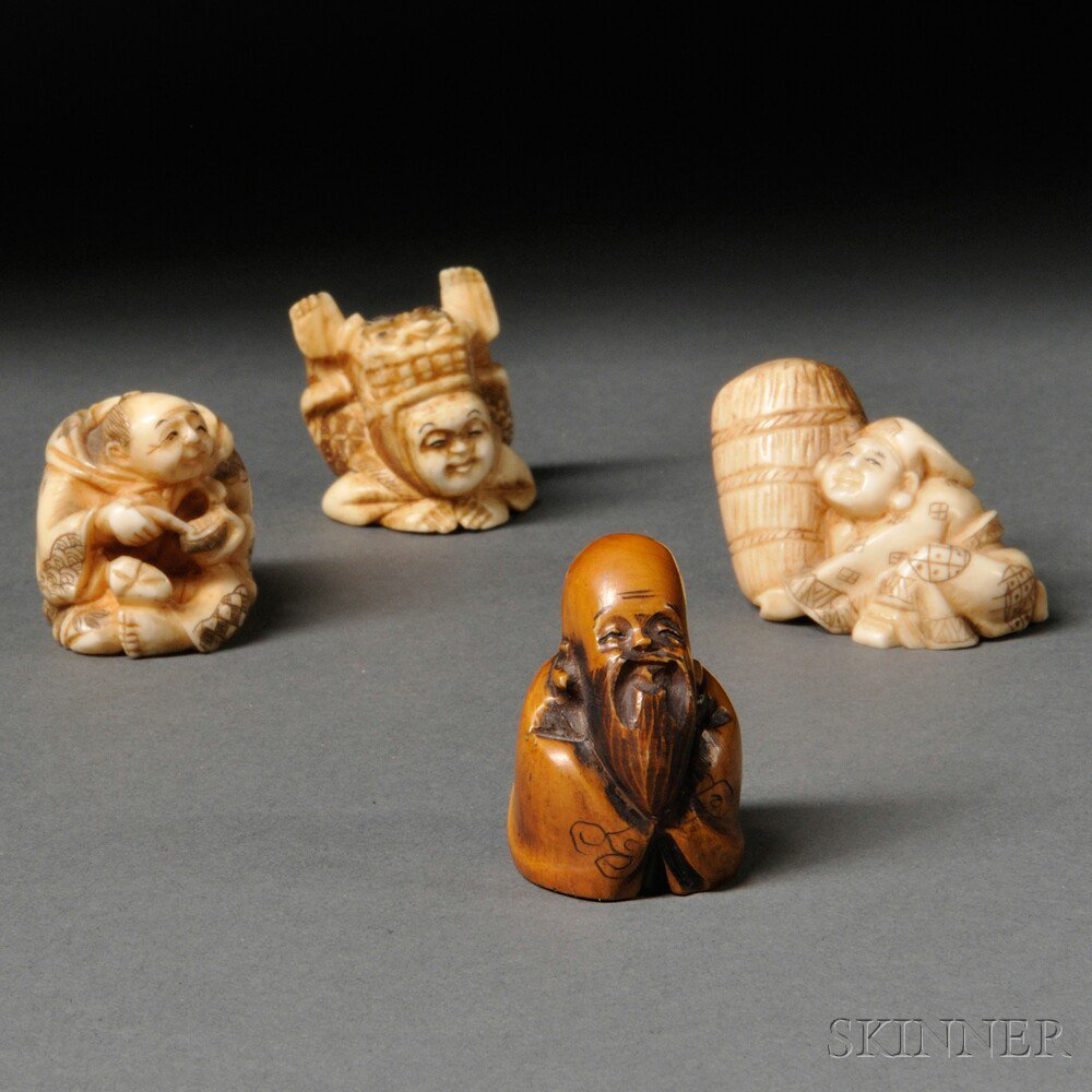 Appraisal: Four Ivory Netsukes Japan th th century figural form one