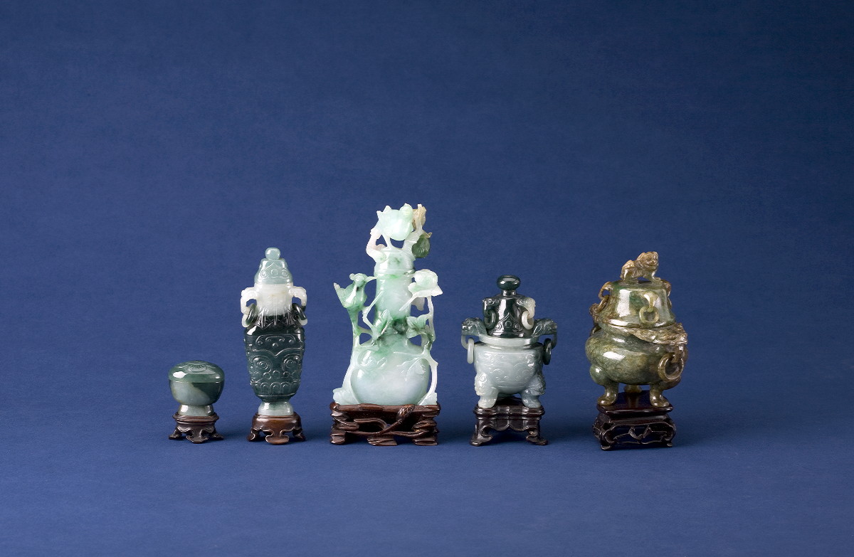 Appraisal: FIVE CHINESE CARVED JADE OBJECTS D'ART With teakwood stands and