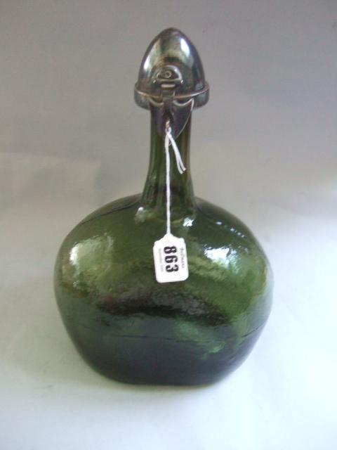 Appraisal: A silver toped moulded olive green glass decanter with a