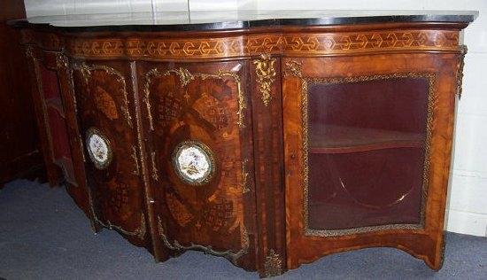 Appraisal: A late Victorian walnut and marquetry side cabinet of serpentine