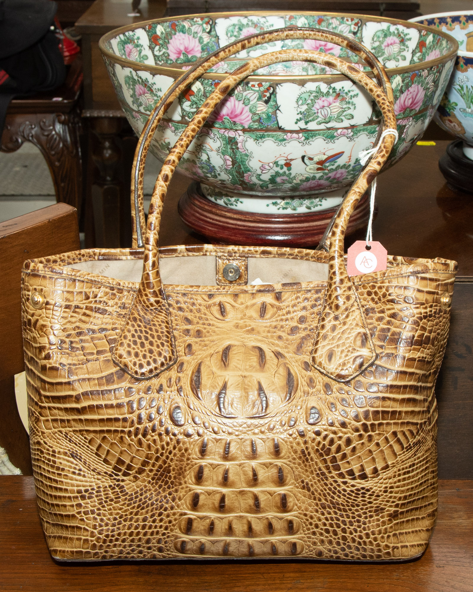 Appraisal: A CROCODILE EMBOSSED BRAHMIN BAG A beige crocodile embossed Brahmin