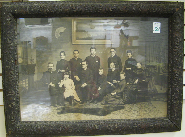 Appraisal: A TH CENTURY VICTORIAN FAMILY PHOTOGRAPH with twelve members in