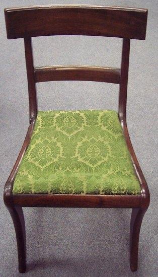 Appraisal: A Regency mahogany dining chair fitted a loose trap seat