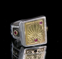 Appraisal: A Konstantino Sterling Silver Ruby Engraved k Gold Square Ring