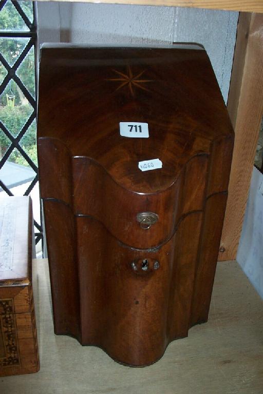 Appraisal: A Georgian mahogany knife box of serpentine form with fitted