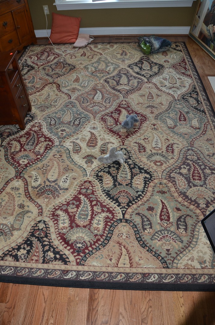 Appraisal: x machine made oriental style carpet