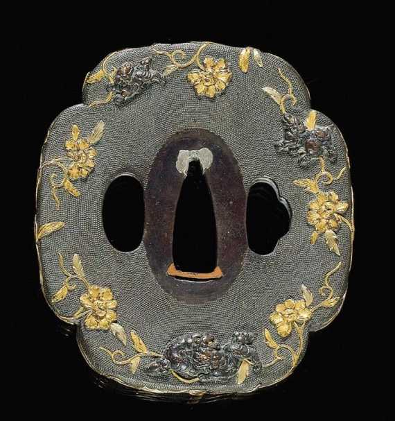 Appraisal: A SHAKUD TSUBA OF PLAYING SHISHI AND PEONIES Japan h