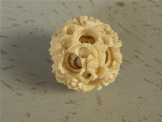 Appraisal: th century ivory puzzle ball and another smaller